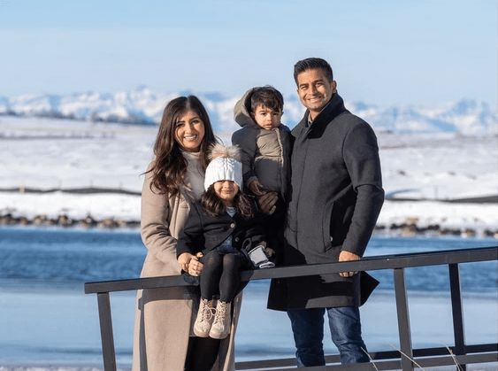 Tania and Keanan Largo-Alfonso with their children, Madison, 4 1/2 years, and Noah, 1 1/2 years, on the dock of their new home in Harmony. PHOTO BY DON MOLYNEAUX /Postmedia